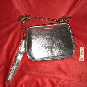 BRAND NEW VICTORIA SECRET SILVER NIGHT BAG